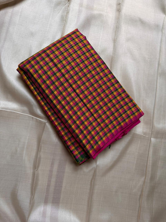Mutyam – Handwoven Borderless Kanchipuram Pure Silk Saree with Traditional Paalum Pazhamum Baby Checks or kasa kasa kattamDual Contrast Green & Pink Selvedges, and a Subtle Zari Woven Pallu