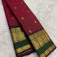 Full view of arakku red Kanchipuram pure silk saree with mayil butta and korvai border — Idam Living