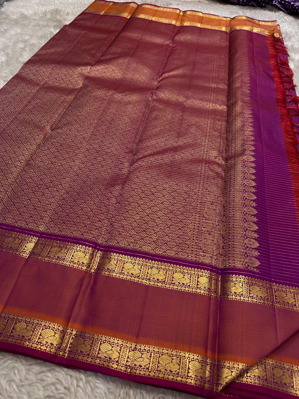 Brick Red Saffron Zari Kattam | Pure Kanchipuram Silk ✨
Brick-red body with zari kattam checks, gold buttas & saffron-orange border ❤️
Silk Mark Certified • Free Shipping within USA • Ships in Two Weeks ✅