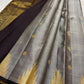 Pure silk kanchipuram grey with zari thazhampoo reku darkest brown or podi color selvedge and Pallu