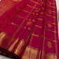Charita – Tomato Red Kanchipuram Silk Saree
With Bold Zari Kattam Checks & Floral Motifs
Featuring Arai Maadam Border & Rettapet border