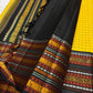Marigold Mani Kattam – Pure Kanchipuram Silk Saree
Vibrant marigold yellow body with classic kattam checks
black borders with elephant & floral zari motifs
Rich black pallu adorned with green & zari stripes . Silk Mark Certified, delivery in 2 weeks