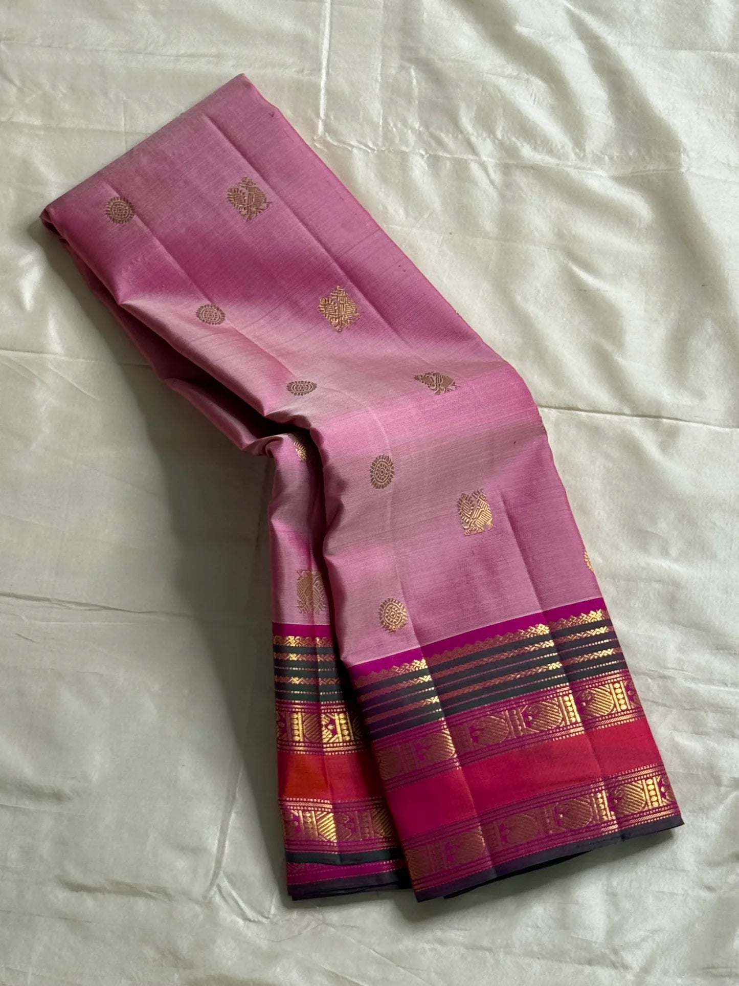 Pink Ombre Kanchipuram Pure Silk

Fuchsia Korvai Border • Charcoal stripes

Gold Zari Buttas (chakram & mango)

Rich zAri Pallu • Blouse included

Silk Mark Certified • Free USA Shipping • Ships in Two Weeks

— Pink Ombre Butta Korvai