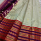 Pure silk kanchipuram grey with sampanga green vairaoosi with detailed ornate varisaipet border thandavalam zari , mayil Butta