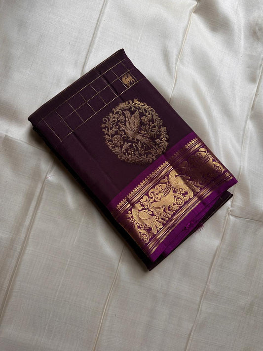 Sorgavaasal Kili , stunning motif in dark brown and purple zari kattam zari woven yazhi buttas in pure silk kanchipuram