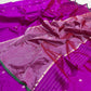 Close view of magenta handloom Chanderi silk with metallic buttas and finely striped woven pallu