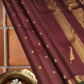 Coffee brown Zari kattam with paisley peacock border kamalam butta and green selvedge , kilo kanjivaram Pallu in pure silk