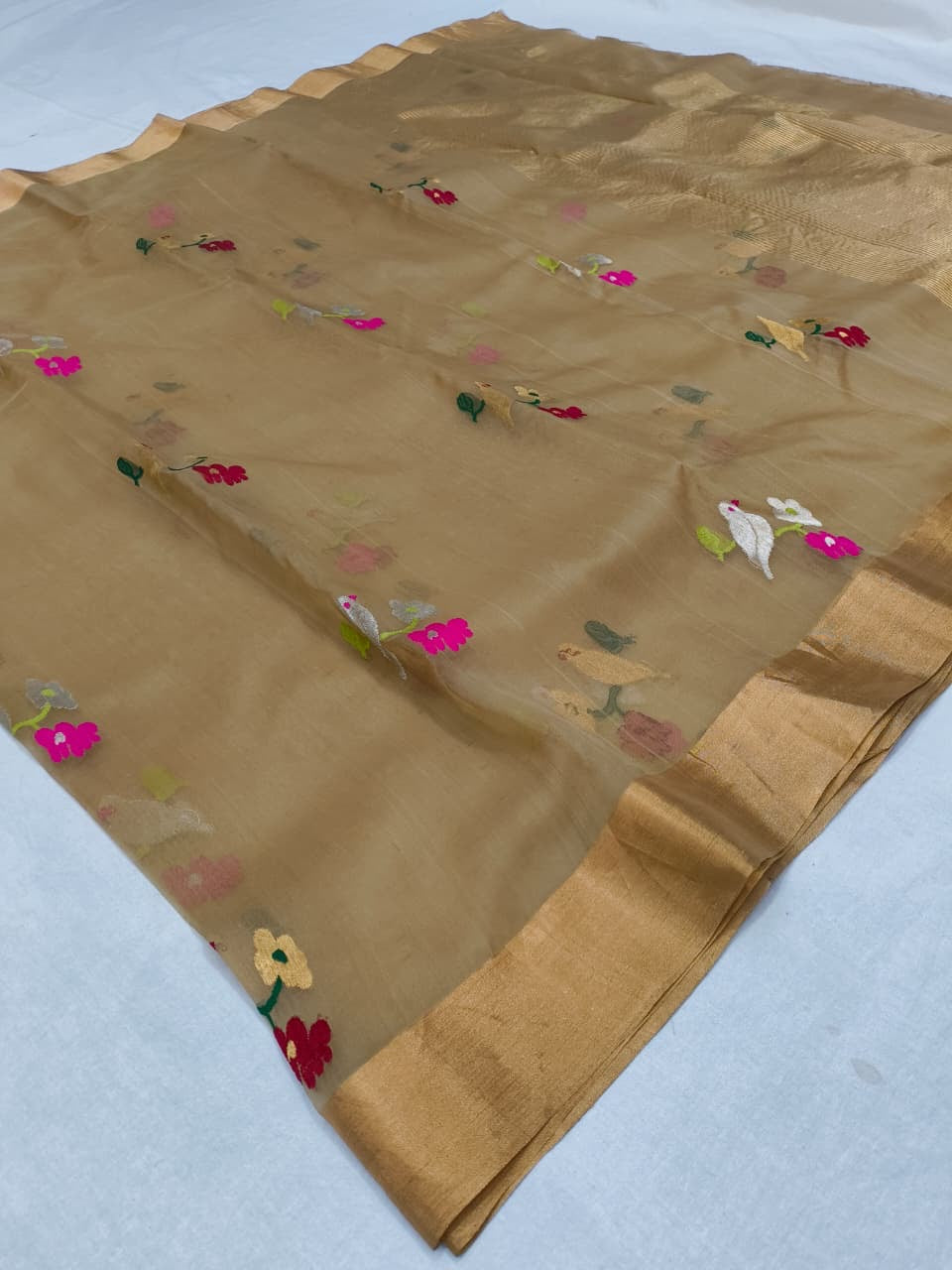 Pure Chanderi Silk Saree
Floral & Bird Embroidery on Sheer Gold-Beige
Tissue Zari Border • Lightweight • Elegant Drape