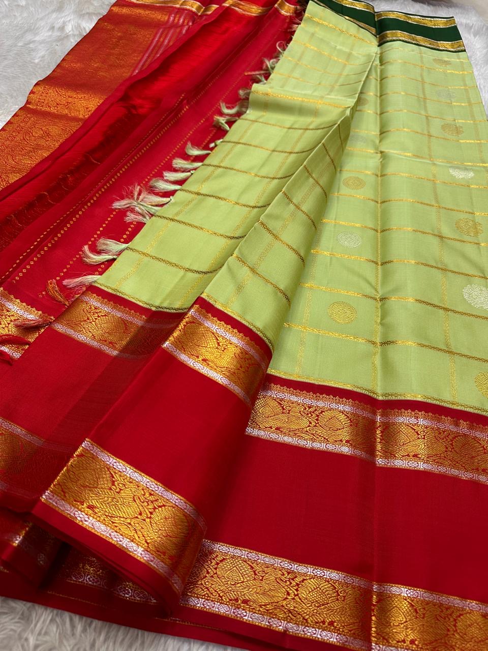Pistachio Ganga Jamuna – Pure Kanchipuram Silk Saree
pistachio green body with zari kattam & floral buttas ✨
Ganga Jamuna borders in emerald green & vermilion red 🌿🔥
vermilion red pallu richly woven with zari, Silk Mark Certified, delivery in 2 weeks