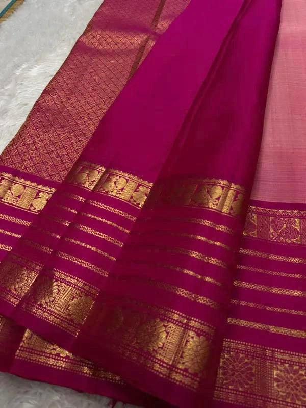 “Roja” Petal Pink Kanchipuram Pure Silk Saree
Peacock & Floral Zari Buttas on Body
Raspberry Pink Varisaipet Border with Ornate Kamalam Gorgeous Grid Pattern Zari Pallu