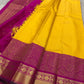 Manjula – Vibrant Yellow Pure Silk Kanchipuram Saree with Handwoven Magenta Benares-Style Dual Border, Maanthulir Green Selvedge, and Intricate Paisley, Rudhraksham & Floral Motifs on Pallu