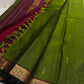 Varnam – Leaf Green Pure Kanchipuram Silk Saree with Gold Zari Buttas, Trellis Design Arakku Border, and Contrast Maroon Zari Pallu