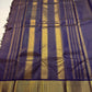 Krishna Shyama — Pure Silk Kanchipuram

Deepest purple “Shyama” body with Vairaoosi pinstripes

Temple-inspired antique gold zari borders with green selvedge

Grand striped zari pallu with hand-tied tassels

Silk Mark Certified • free shipping