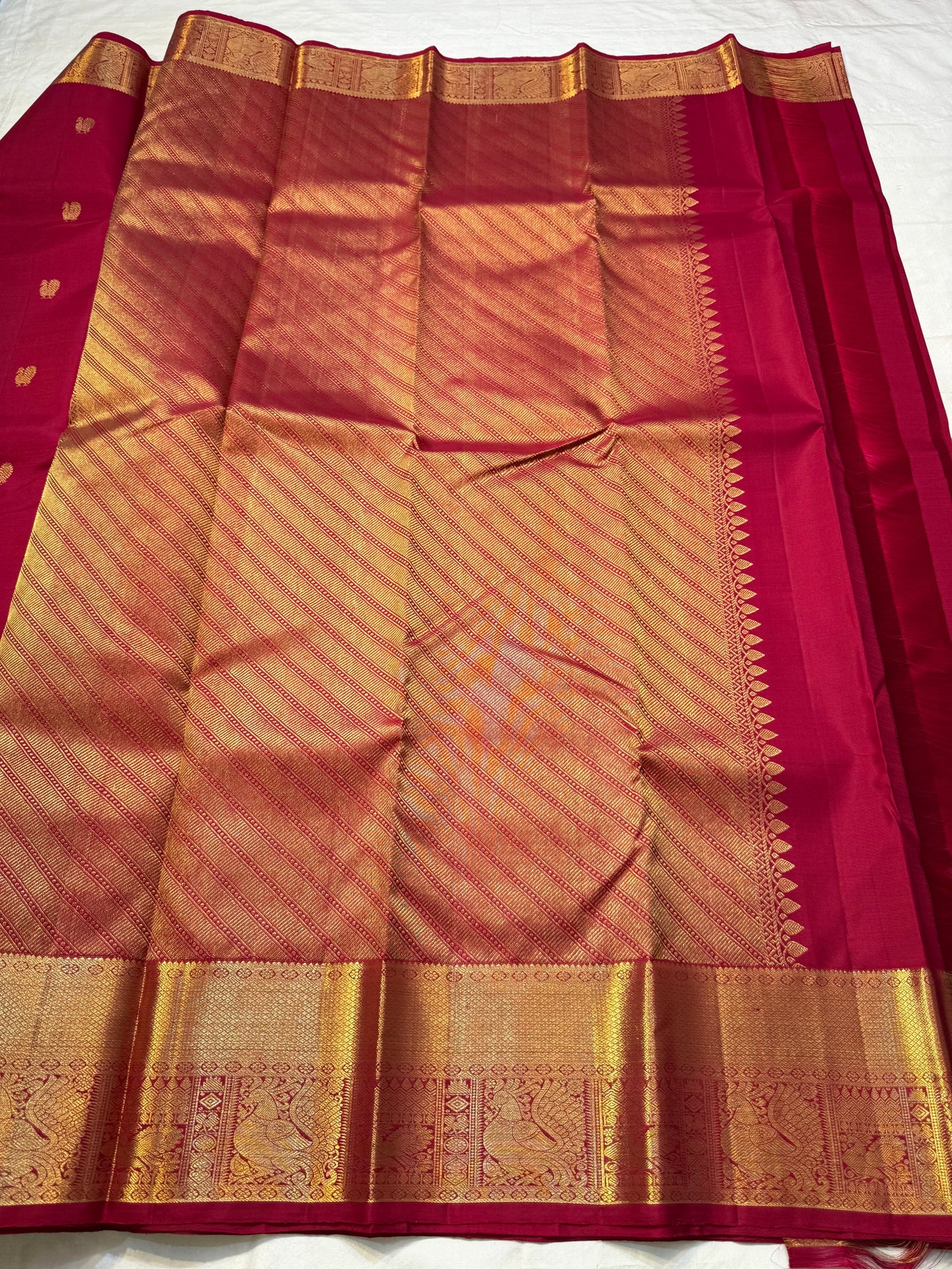 Vermillion Glory — Deep Red • Pure Silk Kanchipuram Saree
Gold zari buttas with grand peacock borders & brocade pallu
Silk Mark Certified • Free USA Shipping • Ships in Two Weeks ✅