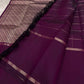 Close view of zari-woven pallu panel with intricate diagonal texture and border detailing on a plum Pure Kanchipuram silk saree.