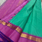 Jade Blossom – Pure Silk Kanchipuram Saree
Elegant Jade-Teal Body with Lustrous Weave 🌿
Rani-Magenta Contrast Border with Gold Zari ✨ purple selvedge 
Grand Magenta Pallu in Lattice Design
Silk Mark Certified | ships in 2 weeks