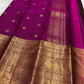 Espresso brown Pure Silk Kanjivaram Butta saree with grand Yazhi zari border and rani pink contrast