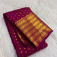 Deep Vadamalli Kanchipuram saree showing its gold floral border and densely woven geometric zari pallu.