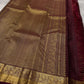 Zari Kattam Araimaadam – Coffee Brown, Pure Kanchipuram Silk Saree
Coffee-brown body with zari kattam checks, floral & mango buttas
Grand antique-gold border with floral/peacock vine;
Silk Mark Certified | Blouse Piece Included |ships in 1 week