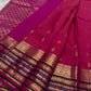Kaamini ✨ — Fuschia Pure Kanchipuram Silk Saree
With Scattered Gold Zari Buttas on Lustrous Body
Bold Striped Korvai Border in Green & Blue Accents
Grand Fuschia Pallu Woven in Intricate Gold Zari
Contrast Blouse with Matching Zari Border Finish