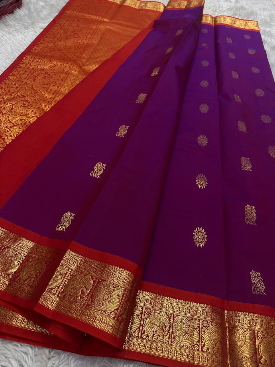 Swaram Lightweight – Berry Pink Purple
Feather-Light Berry Kanchipuram Silk Saree
Red Borders & Elephant Procession Zari