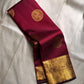 A majestic maroon Kanchipuram silk saree, adorned with intricate golden zari featuring the mythicalYazhi (Yali ) motifs—a symbol of divine strength and protection in Hindu mythology. The grand temple-style gold border adds depth and regality, making this