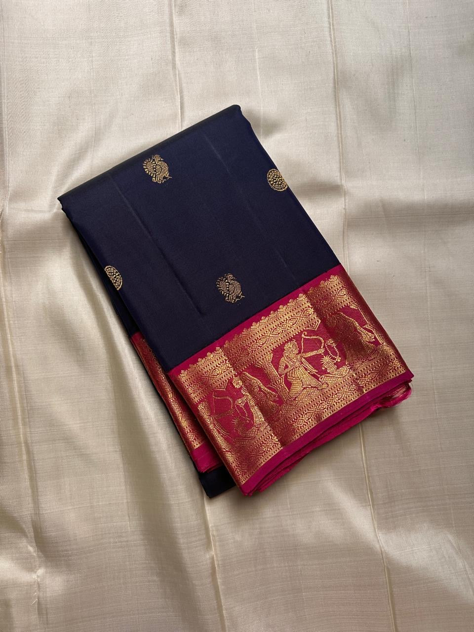 Sita parinayam envisioned in pure silk Kanchipuram elegance deep blue with magenta