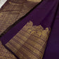 Swarna
Majestic Purple Pure Silk Kanchipuram Saree with Broad Varisaipet Zari Border,Intricately Woven Peacock and Elephant Motifs alongside border . Peacock motifs all over.
