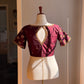 Aarvi – Handwoven Deep Maroon-Brown Silk Blouse with Traditional Maggam Embroidery, Antique Gold Beadwork & Kemp jadau work Stones Inspired by  Temple Jewelry- delivery in 3 to 4 weeks