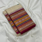 Pari Silk Thread Weaving — Pure Silk Kanchipuram

Ivory body with multi-color silk thread buttas (teal, wine & magenta)
Korvai contrast wine-magenta borders with vintage thread stripe panels
Temple gopuram inner edge & grand pallu in handwoven silk thread