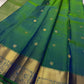 Dia ✨ – Vibrant Peacock Green Kanchipuram Pure Silk Saree
Gold Zari Buttas Adorning the Body
Intricate Gaja–Annam (Elephant & Peacock) Motif Border
Coordinated Peacock Green Silk Blouse Piece Included
Silk Mark Certified | Fall & Pico Done | Ready to Ship