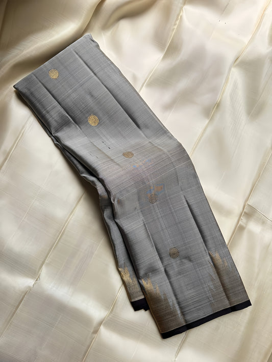 Pure silk kanchipuram grey with zari thazhampoo reku darkest brown or podi color selvedge and Pallu