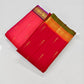 Mullai Moggu Red — Pure Kanchipuram Silk Saree
Deep kumkum-red body with mullai bud zari buttas & antique-gold border with green selvedge
Radiant orange-gold zari pallu • Silk Mark Certified • Free Shipping within USA • Ships in Two Weeks