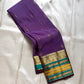 Kaamini ✨ — Purple Pure Kanchipuram Silk Saree
With Elegant Brown Korvai Border & Bold Stripes
Adorned with Scattered Gold Zari Buttas on Body
Intricate Zari Weaving in Regal Brown Pallu
Contrast Blouse with Matching Korvai Border