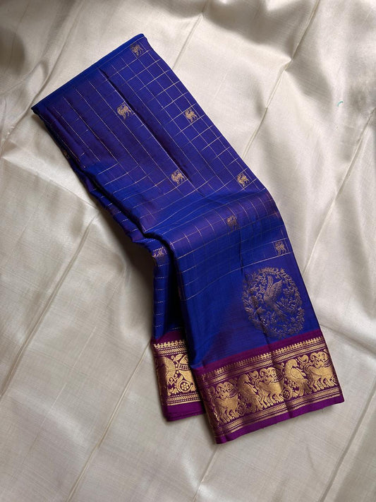 Sorgavaasal Kili , stunning motif in  MS blue and purple zari kattam zari woven yazhi buttas in pure silk kanchipuram