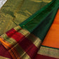 Orange Maragatha Korvai — Kanchipuram Pure Silk

Sunset aruna-orange body with delicate single zari butta

Deep maroon korvai borders with floral rosette motifs; green selvedge

Rich maragatha-green zari pallu (zari jaal & vine panels)..description