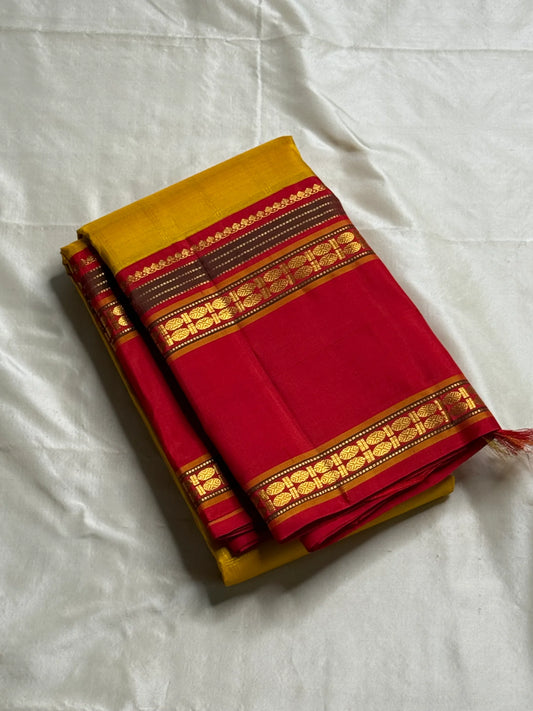Vasantha Malli ✨
Pure Kanchipuram Silk Saree in Marigold & Kumkum Red
Marigold body with delicate woven checks
Kumkum-red border highlighted with Manthulir Green

Silk Mark Certified, delivery in 2 weeks