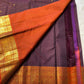 Deep Plum Orange
A regal dance of plum and burnt orange
Micro-checks kissed with golden buttas
Elephant borders marching in heritage grandeur
Brocade pallu glowing in timeless zari brilliance

Silk Mark Certified, delivery in 2 weeks