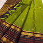 Handwoven pure silk saree from Kanchipuram with Varisaipet weave in olive green and charcoal