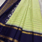 Lush cardamom color veldari pure silk Kanchipuram with dark blue purple border paisley manga on Pallu green and pink, alternating veldari on body