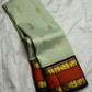 Pure Kanjivaram Silk Saree • Rettapet Yaanai Border • Pistachio Green with Rust Orange