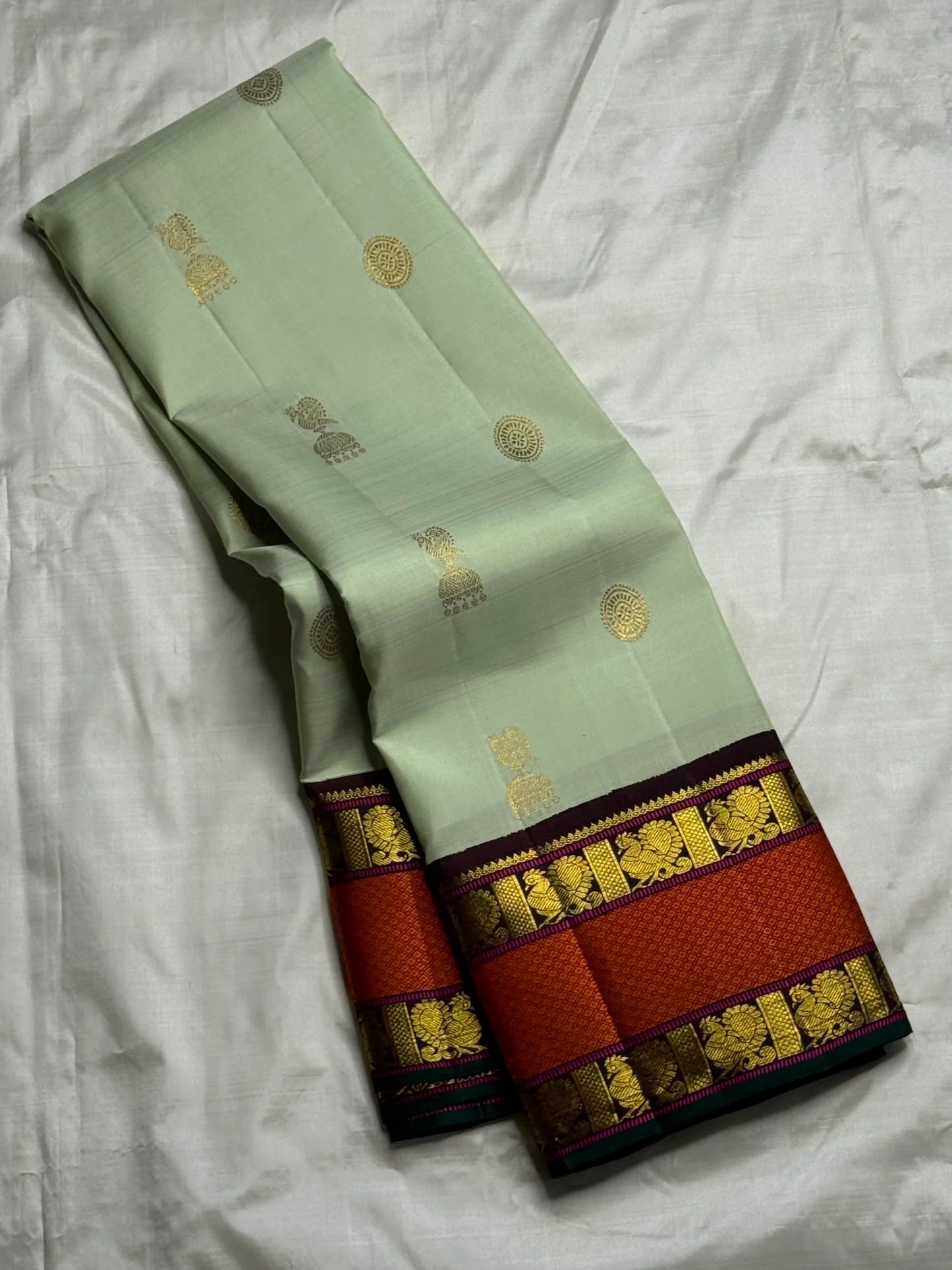 Pure Kanjivaram Silk Saree • Rettapet Yaanai Border • Pistachio Green with Rust Orange