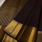 Agnika – Dark Espresso Kanchipuram Silk Saree with Mayil Chakram Butta
Fiery and regal, Agnika features a rich dark espresso silk body with intricate Mayil Chakram (peacock) motifs and a shimmering zari border—an elegant ode to South Indian tradition.