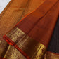 Susheela ✨ – Coffee-Brown Oosi Kattam Kanchipuram Pure Silk Saree
Korvai Burnt-Orange Border with Majestic Peacock Zari Motifs
Intricate Zari-Weave Pallu with Traditional Patterns & Highlights
Contrast Burnt-Orange Blouse Fabric with Matching Zari Border