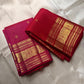 Vermilion Podi Kattam 🌺 Pure Silk Kanchipuram Saree

All-over zari pinstripes & mini podi kattam checks ✨

Broad antique-gold borders with chakram medallions 🪙

Silk Mark Certified ✅ | F