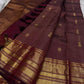 Kani- Brown   ✨ – Shimmery Brown Pure Mulberry Silk Kanchipuram Saree with Intricate Zari Kamalam Buttas, Varisaipet Muthuseer & Annampet Floral Borders, Flowing Vines, Bavanji Border Deck, and Diamond Pet Pallu with Thilakam Motifs  Silk Mark Certified