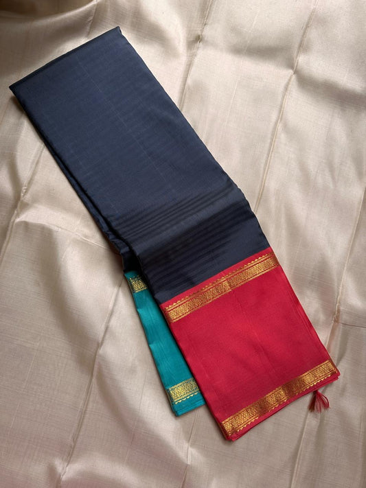 Yamini – Navy Blue Pure Silk Kanchipuram Saree with Ganga Jamuna rettapet Zari Borders
Bold and elegant, Yamini is a handwoven pure silk saree featuring a rich navy blue body with subtle thread detailing, beautiful seer Pallu