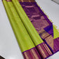 Verdant Gold ✨ – Parrot Green & Violet Pure Kanchipuram Silk Saree
 Gold Zari Buttas in Kattam Weave
Violet Korvai Border with Peacock & Floral Zari Motifs
Grand Violet Brocade Pallu with  Tassels done 
Violet Blouse with Zari Border | Silk Mark