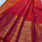 Orange red shot  Zari kattam with ornate border pure silk Kanchipuram with mayil chakram zari butta and detailed Pallu