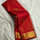 Thilakam Red Vairaoosi — Pure Silk Kanchipuram Saree
Radiant vermilion-red body with gold vairaoosi pinstripes and paisley buttas, paired with a fiery orange-red brocade pallu and grand peacock–elephant zari border ✨
Silk Mark Certified • Fall & Pico Done